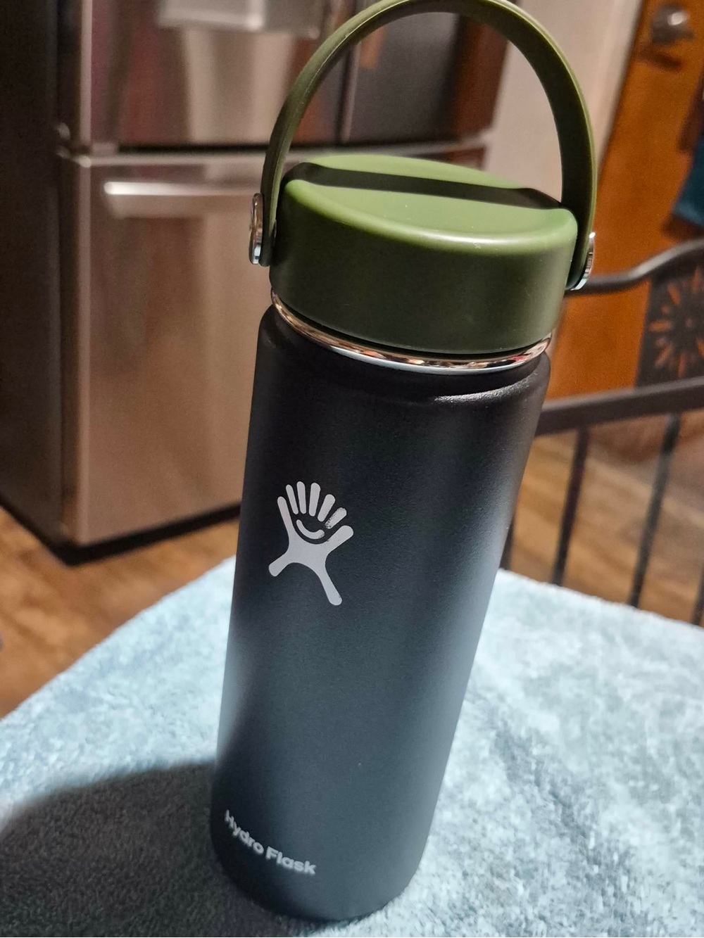 Hydro Flask Black Bottle with Olive Green Cap and Handle 20oz
